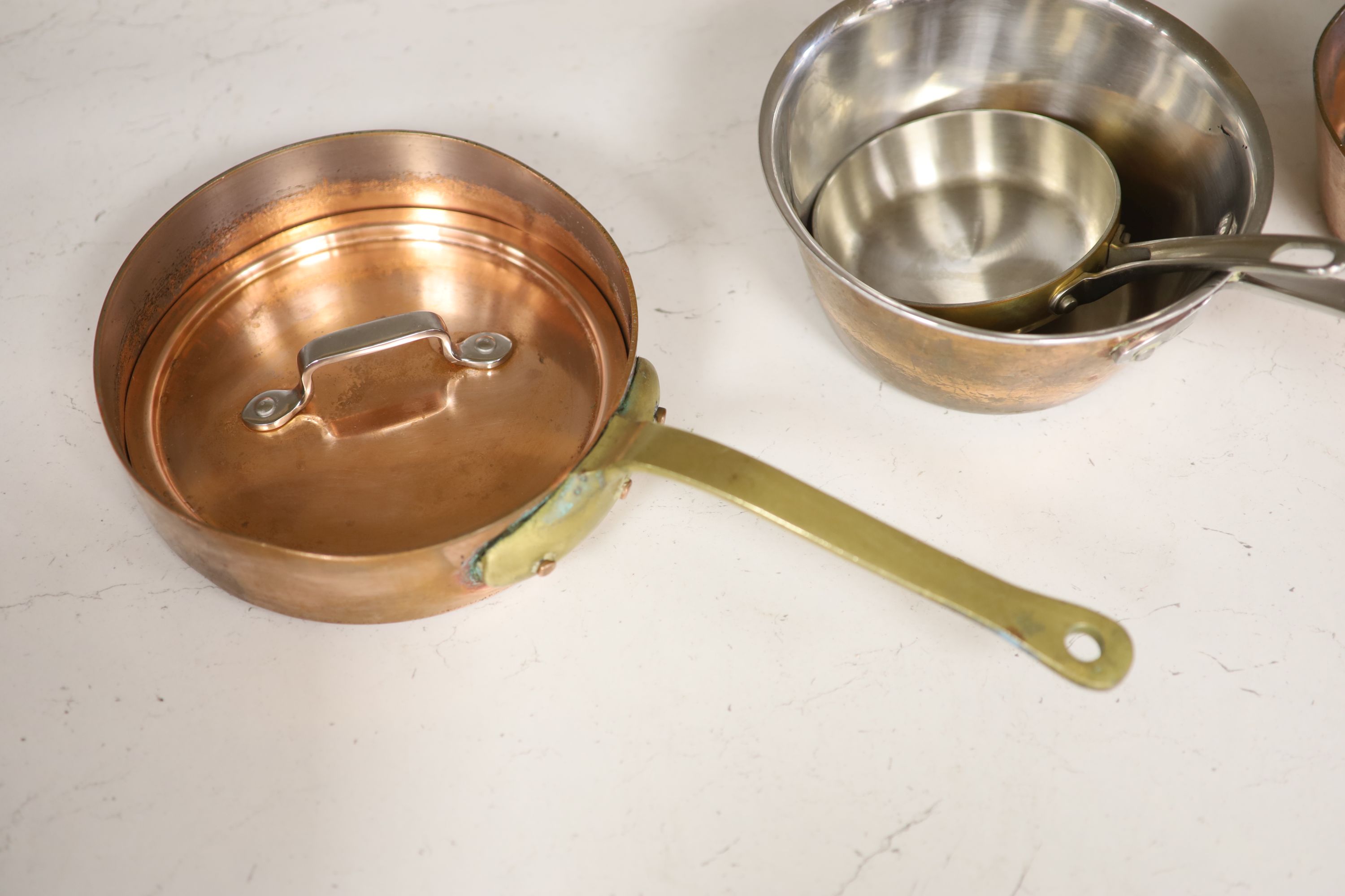 Four French copper pans